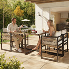 Hand-Woven Garden Sofa Set For 4 People  Made Of Sturdy Iron With 4 Beige Cushions  Incl. 1 Safety Glass Table & 4 Armchairs  Weather-Resistant Patio Furniture Haslam Living